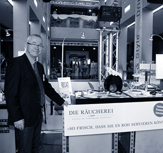 Herr Kunkel an Messestand